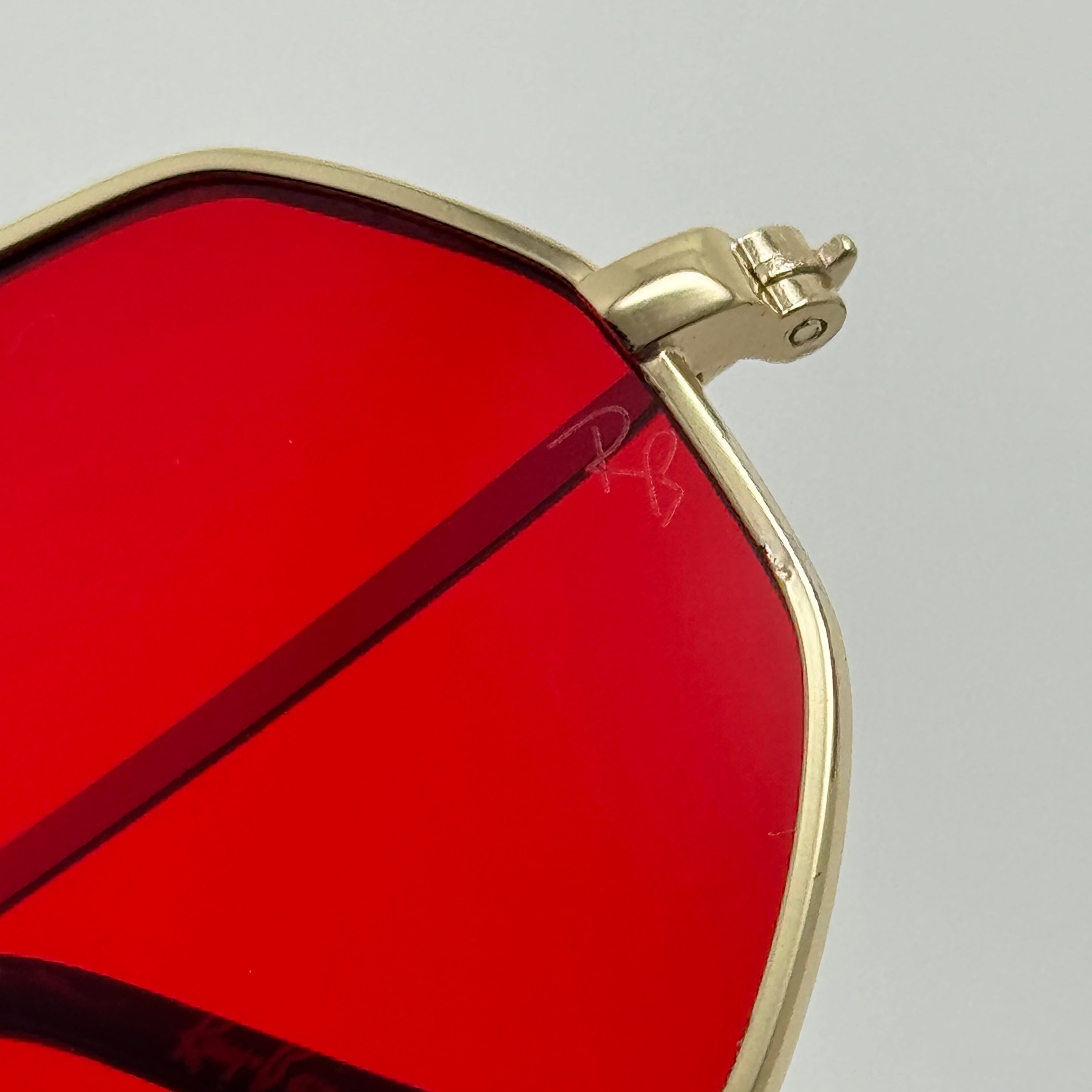 عینک شب ریبن Ray-ban قرمز فریم طلایی کد RB 3556