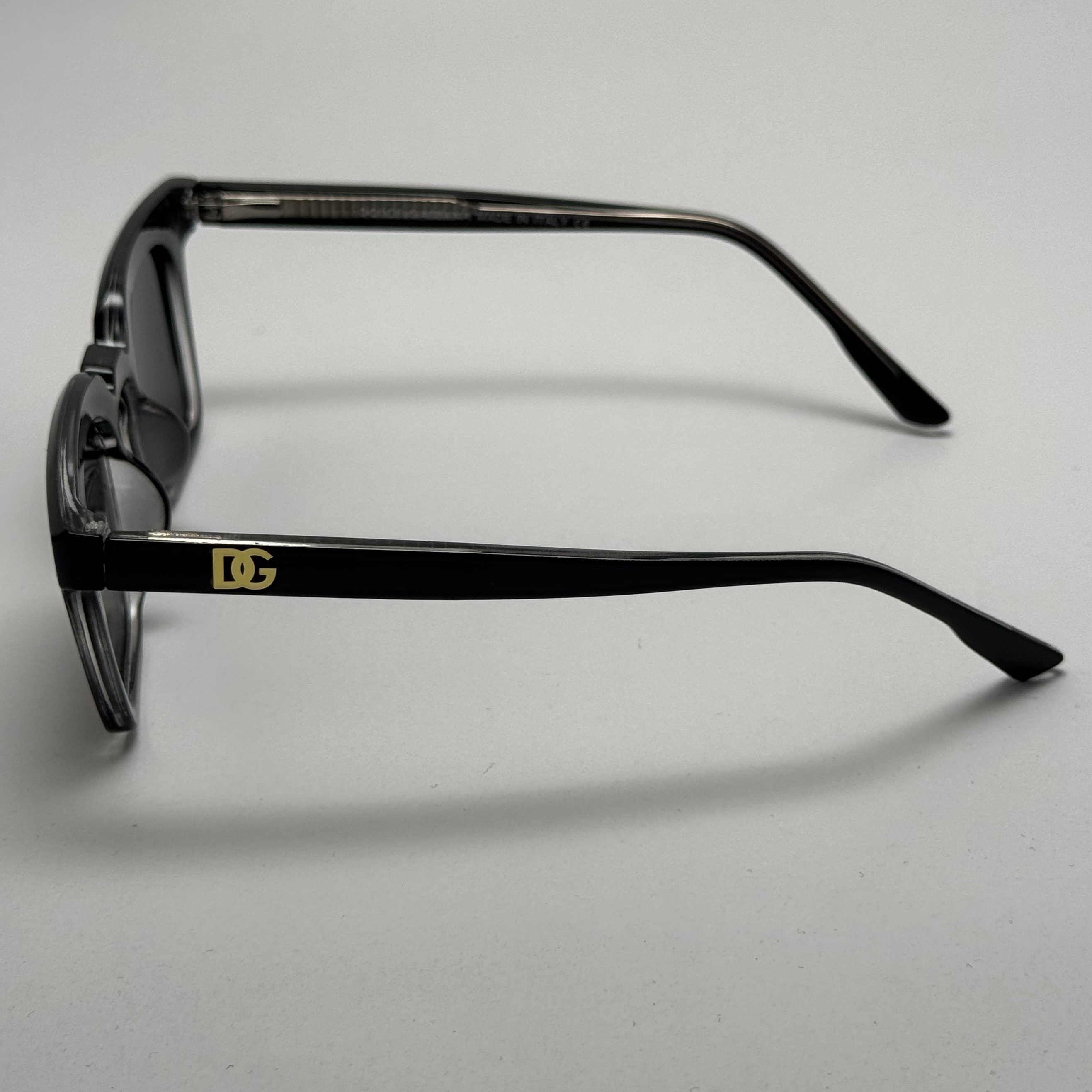 عینک آفتابی پلاریزه دولچه گابانا DOLCE GABBANA دسته سیم کشی شده لولا فنر مشکی کد 7707