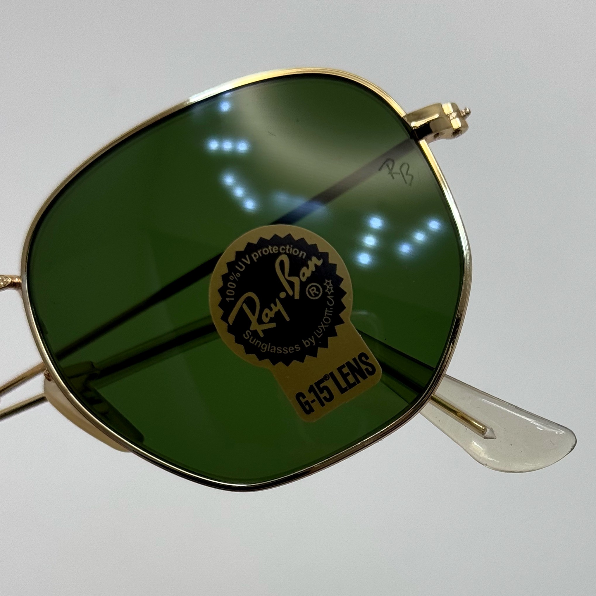عینک ریبن هگزونال شیشه سنگ سیز فریم طلایی به همراه پک کامل ریبن کد Rayban RB 3548