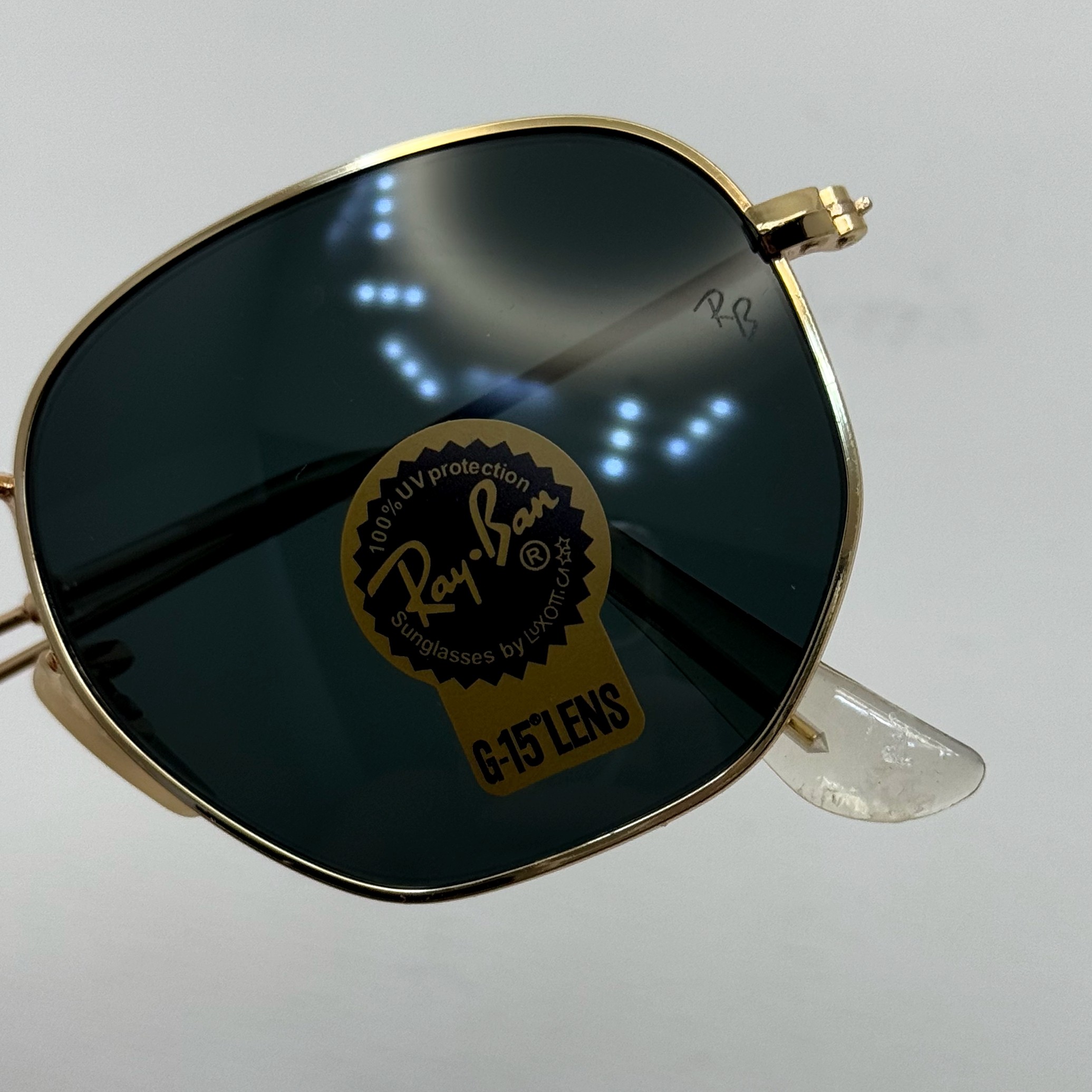 عینک ریبن هگزونال شیشه سنگ مشکی فریم طلایی به همراه پک کامل ریبن کد Rayban RB 3548