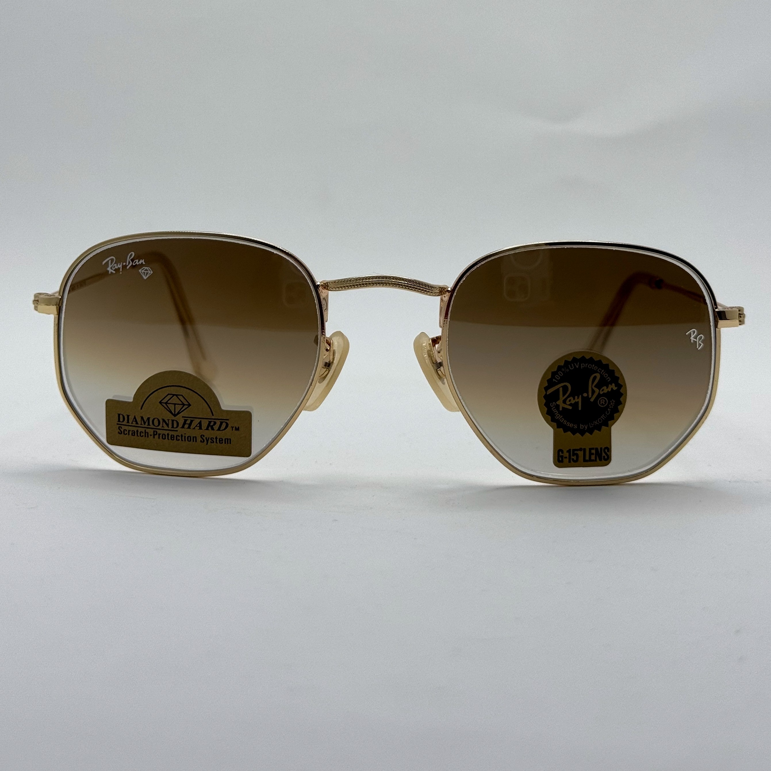 عینک ریبن شیشه سنگ هگزونال قهوه ای هایلایت آنتی رفلکس به همراه پک کامل ریبن کد Rayban RB 3548