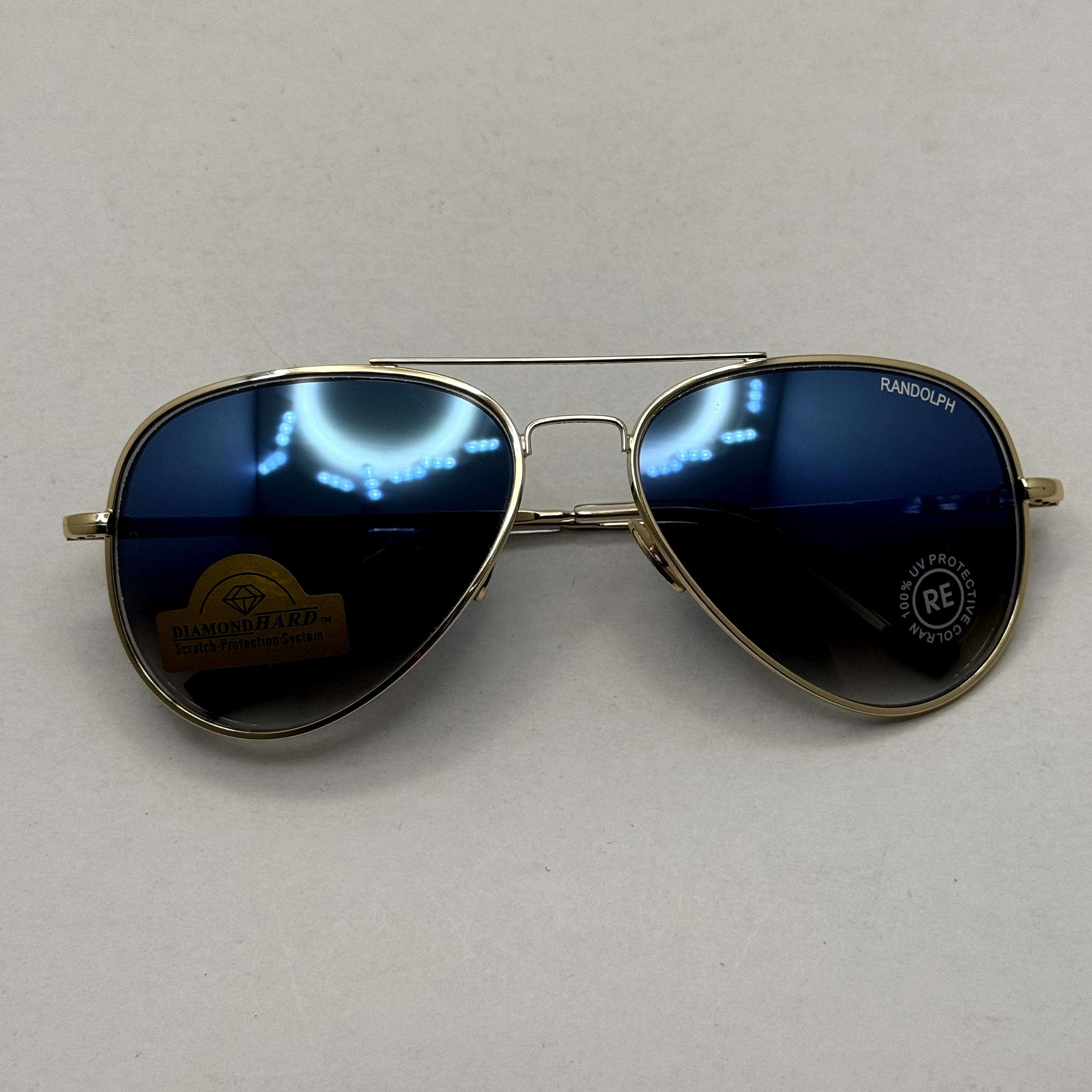 عینک آفتابی و شب خلبانی رندولف شیشه سنگ مدل کانکورد آبی فریم طلایی فول پک RANDOLPH CONCORD CR 231 24K GOLD