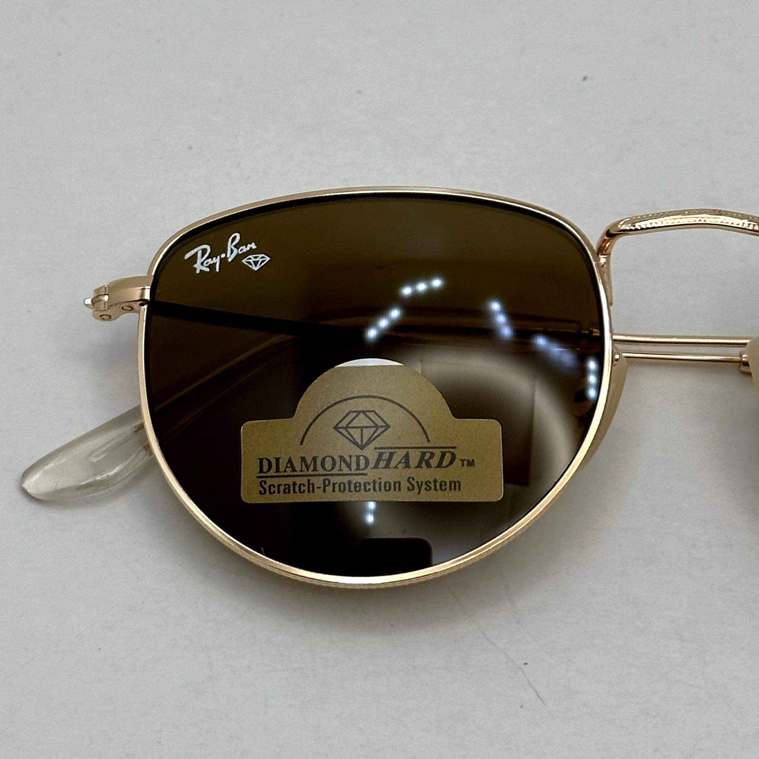 عینک آفتابی ریبن rayban شیشه سنگ قهوه ای طلایی کد rb 3958 - فول پک