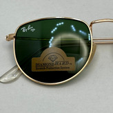 عینک آفتابی ریبن rayban شیشه سنگ سبز طلایی کد rb 3958 - فول پک