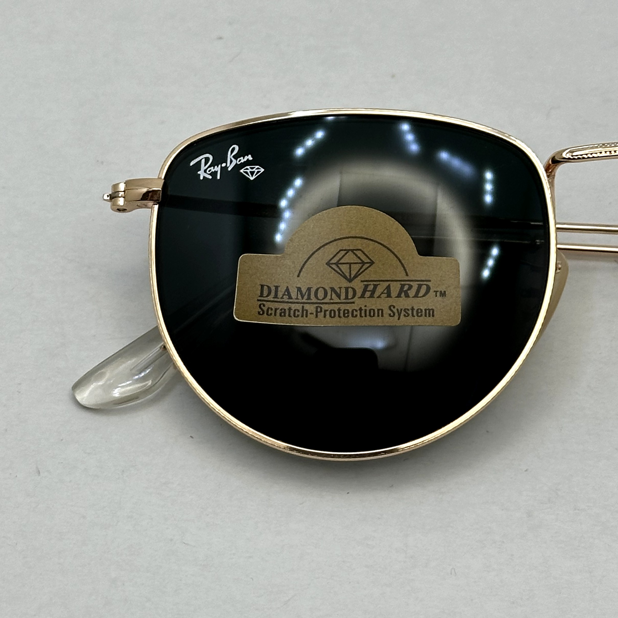 عینک آفتابی ریبن rayban شیشه سنگ مشکی طلایی کد rb 3958
