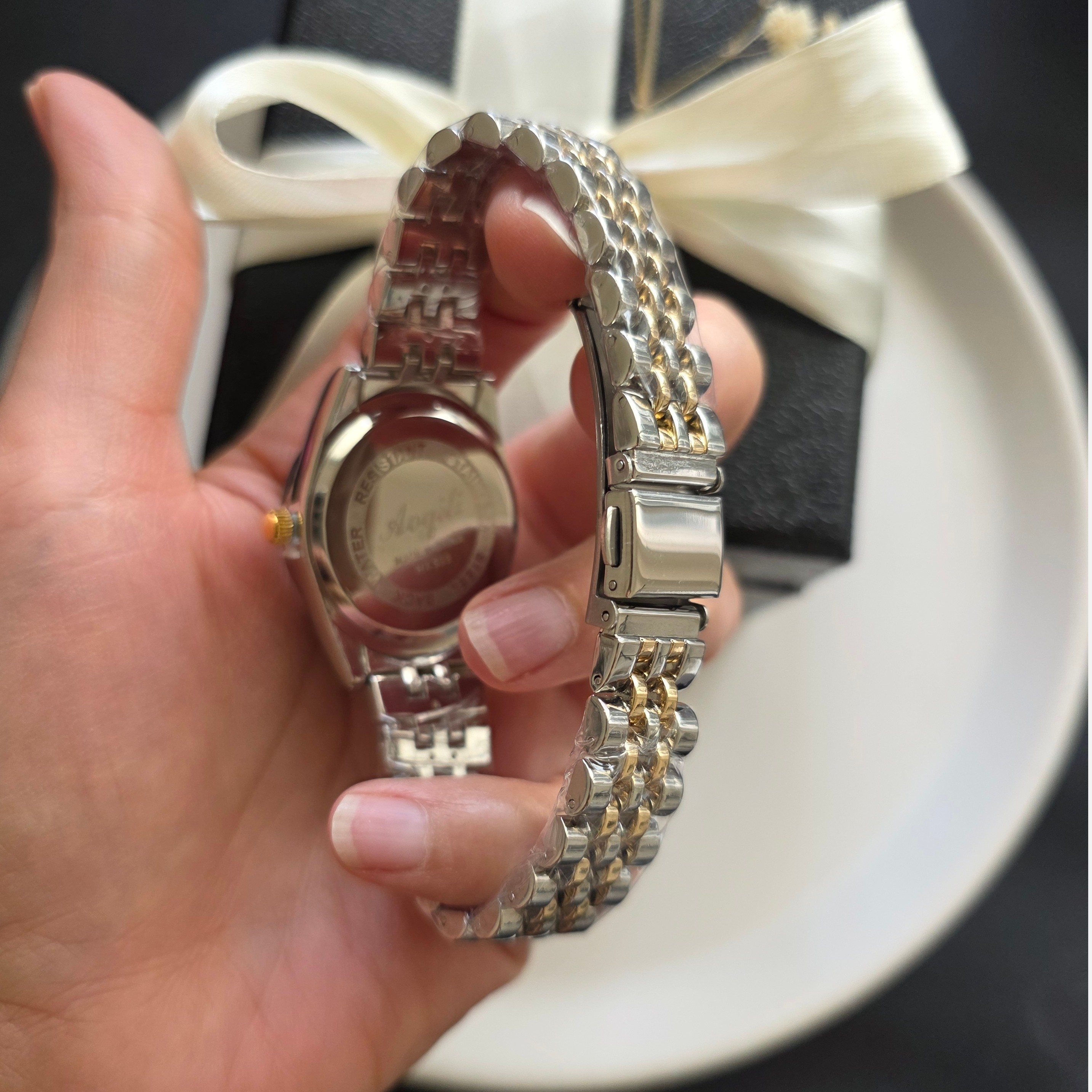 ساعت دخترانه آکیلی دو رنگ نقره ای طلایی