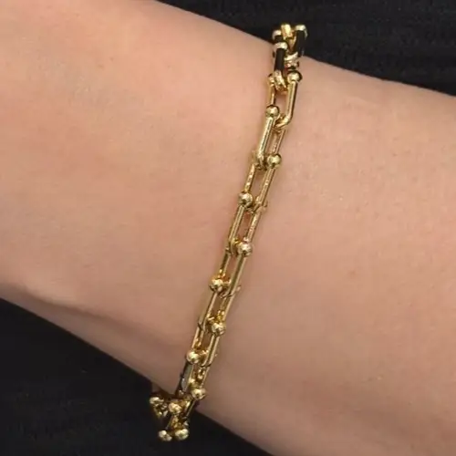 دستبند یونیسکس زنانه و مردانه آبکاری نقره تیفانی tiffany طرح طلا رنگ ثابت کد agy (پس کرایه)
