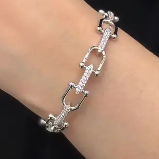 دستبند زنانه و دخترانه آبکاری نقره جواهری HERMES هرمس نگین کاری شده رنگ ثابت کد agy (پس کرایه)