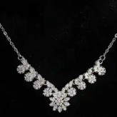 نیم ست زنانه گردنبند و گوشواره جواهری نگین کاری طرح گل خورشیدی ضد حساسیت رنگ ثابت کد amp (پس کرایه)