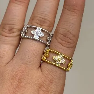 انگشتر زنانه طرح دولاین ونکلیف Vancleef در دو رنگ طلایی و نقره ای آبکاری نقره رنگ ثابت فری سایز Freesize کد zgy (پس کرای