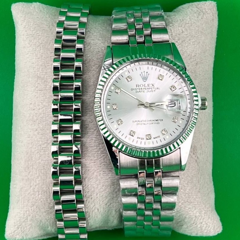 ساعت و دستبند رولکس Rolex مردانه استیل، تاریخ دار و دارای عقربه دید در شب رنگ ثابت کد zki (پس کرایه)