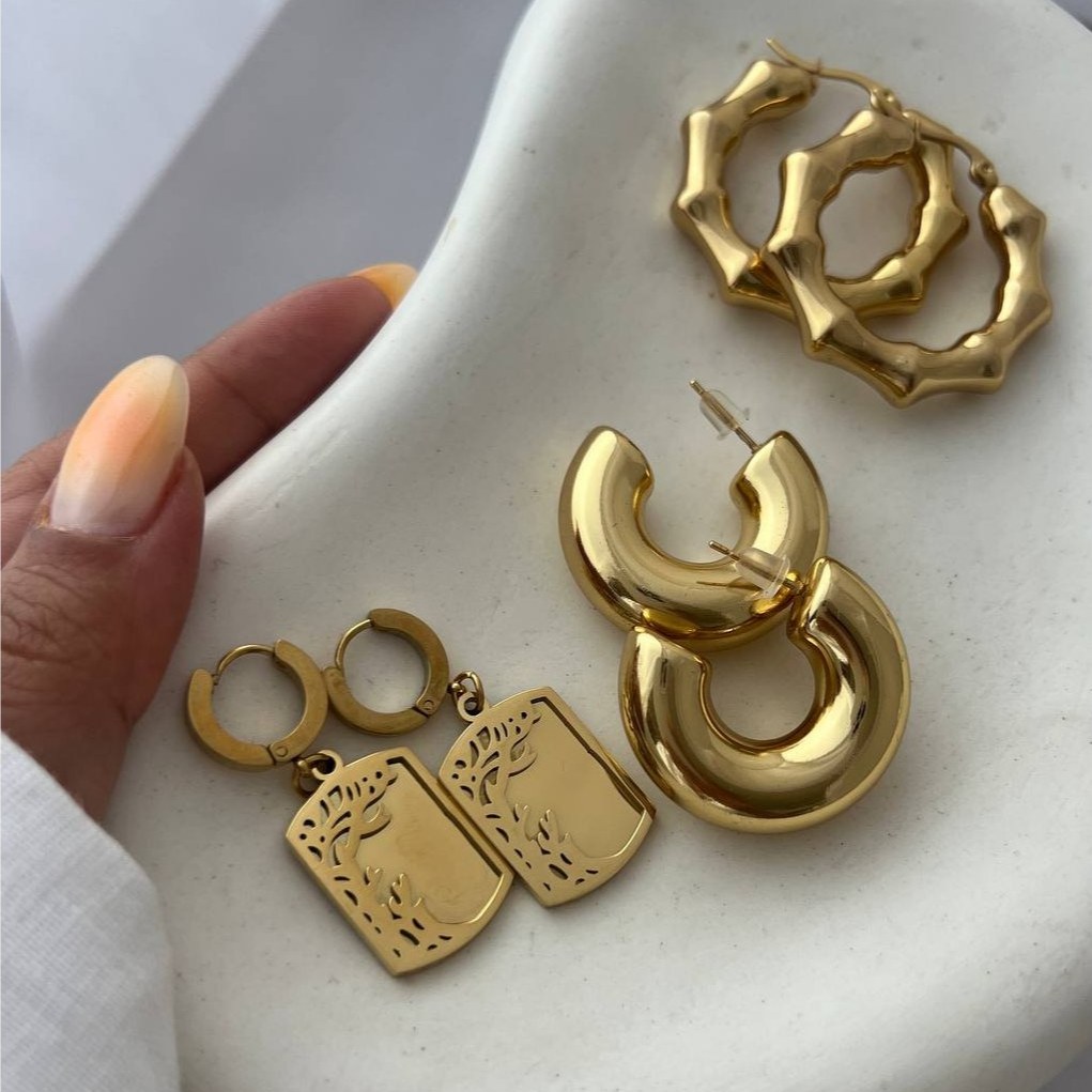 گوشواره استیل زنانه طرح وسط مروارید تنوع طرح رنگ ثابت و ضد حساسیت کد tj (پس کرایه)