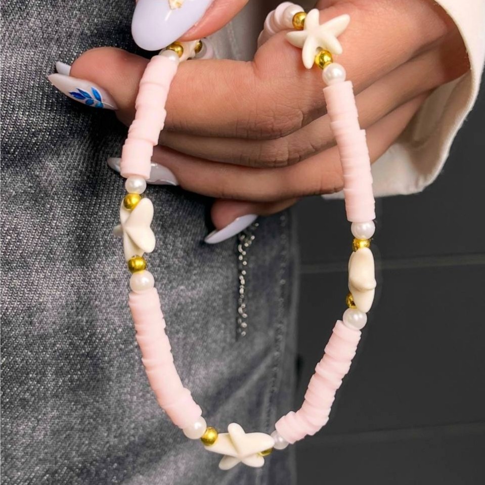 گردنبند زنانه طرح مهره ستاره دریایی تنوع طرح رنگ ثابت کد tk (پس کرایه)