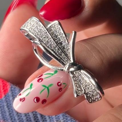 انگشتر طرح جواهری زنانه طرح پاپیون گره ای نگین رنگ ثابت کد tk