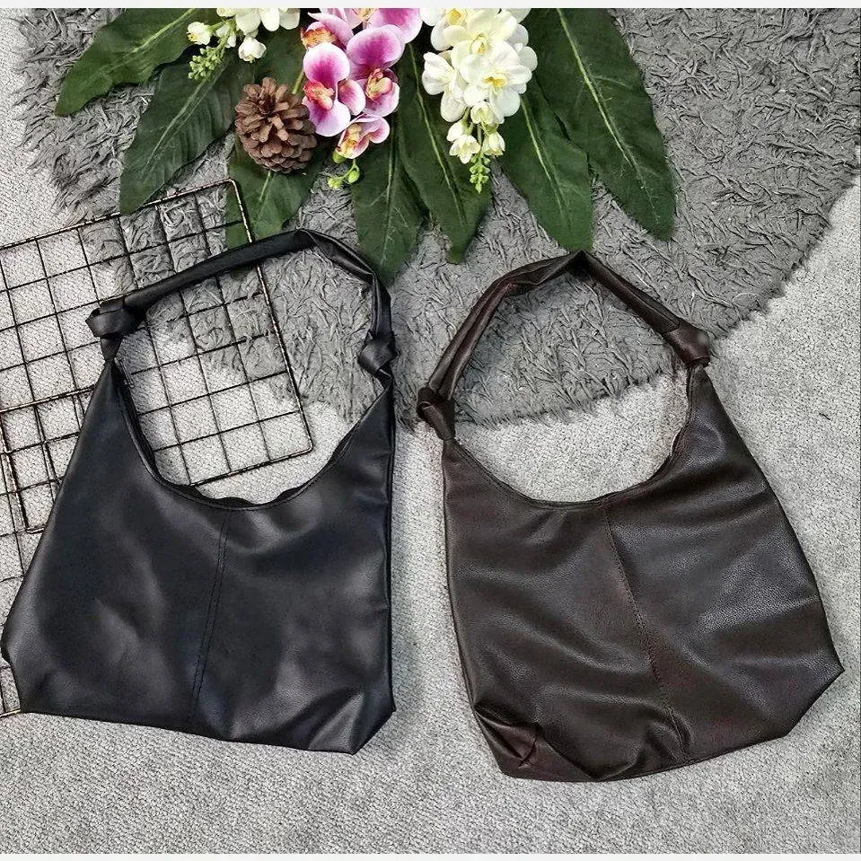 کیف چرمی بند گره ای سبک و جادار ابعاد 30 در 40 سانتی متر
