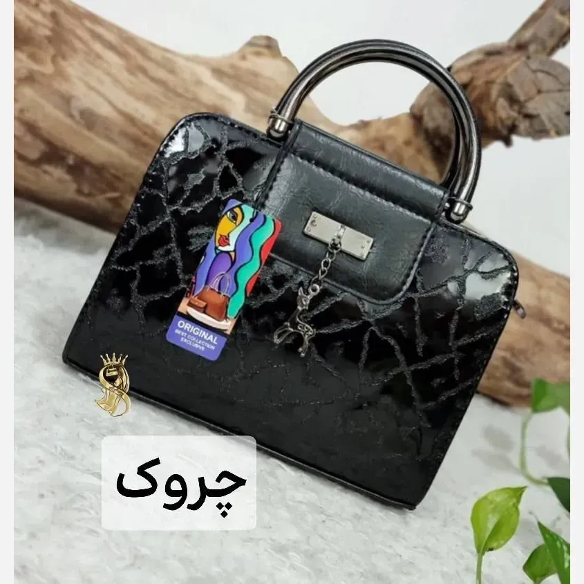 کیف مجلسی زنانه ورنی مدل اهو ابعاد 19 در 25 سانتیمتر