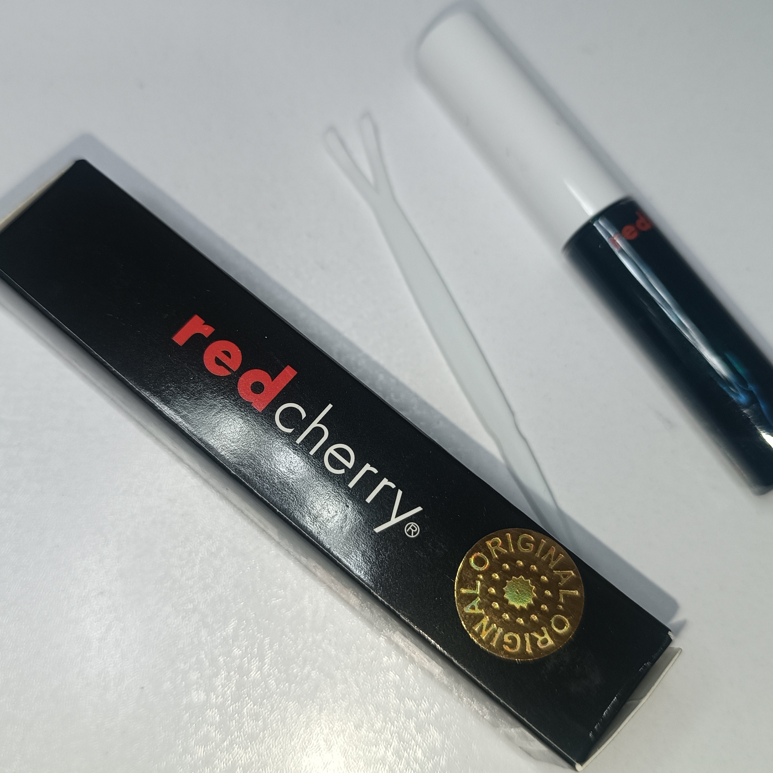 چسب مژه یک ماهه ردچری مشکی اصل هولوگرام دار redcherry