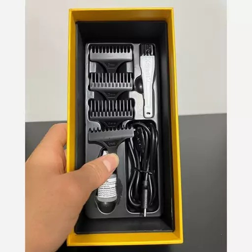 ماشین اصلاح خط زن موی سر و صورت کیمی مدل Kemei 1556