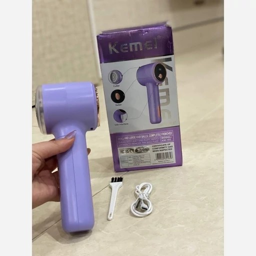 پرزگیر شارژی کیمی مدل KEMEI KM-165 منبع انرژی باتری 1200 میلی آمپر