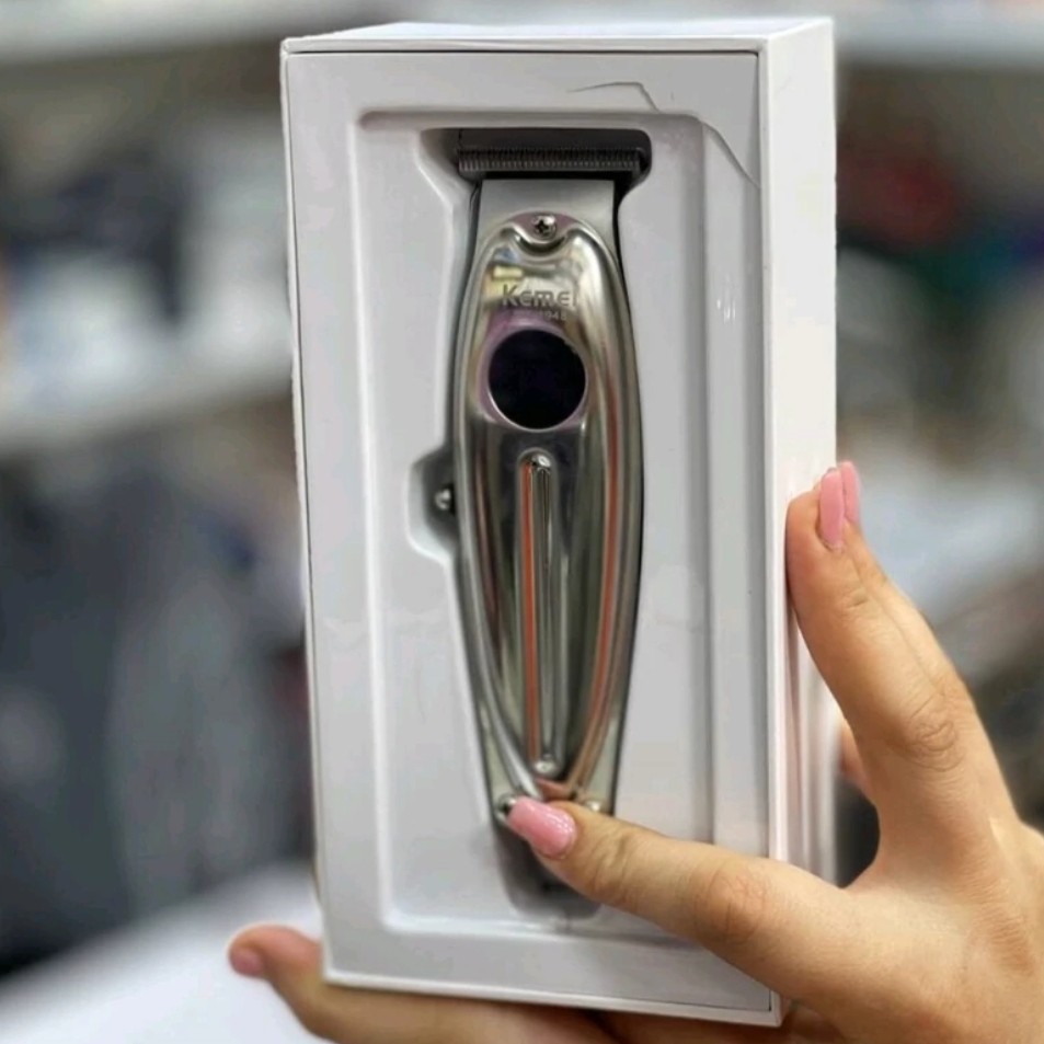 ماشین اصلاح کیمی مدل KM -1948 دارای صفحه نمایشگر باطری 1400 میلی آمپر قدرت موتور 7000 RPM ضد حساسیت