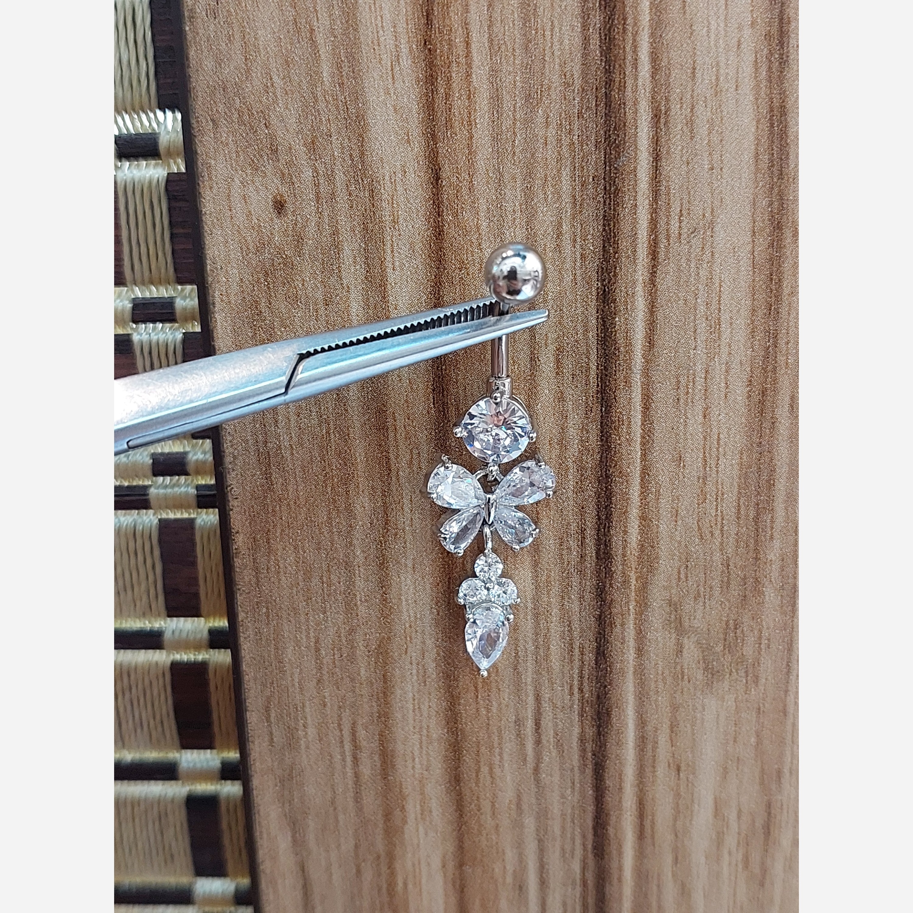 پیرسینگ ناف استیل آویز دار مدل جواهری کد 002