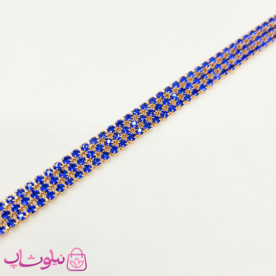 دستبند دخترانه ژوپینگ طرح تنیسی آبی طلایی سه لاین کد 5491