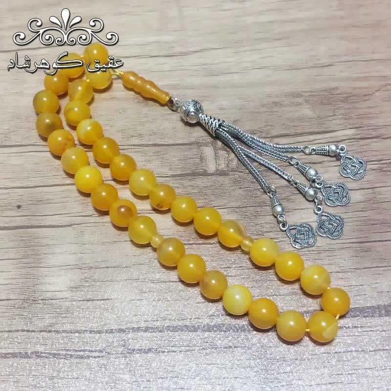 تسبیح عقیق زرد اصل درشت با شرابه فلزی