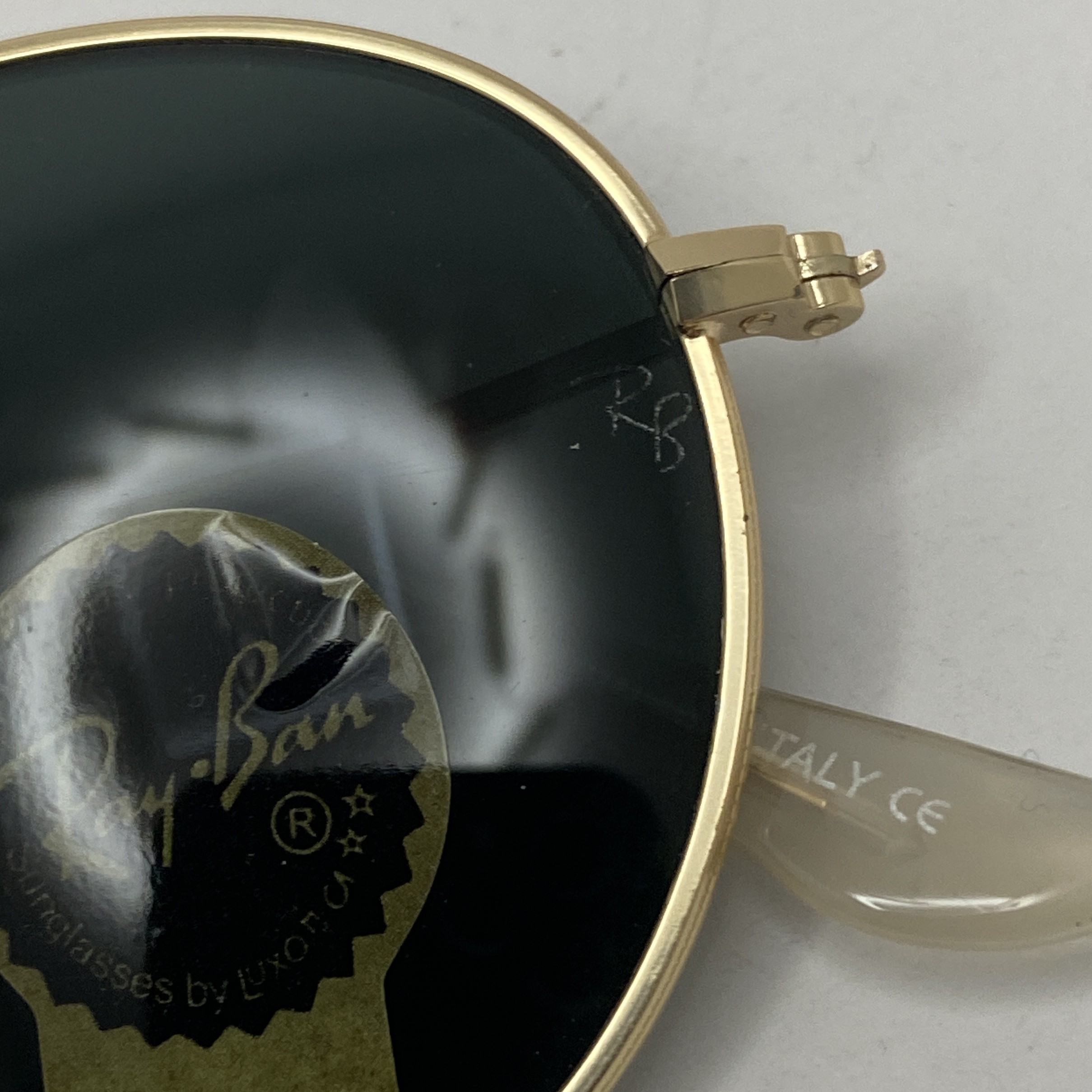 عینک آفتابی ریبن rayban گرد مشکی طلایی شیشه سنگ RB 3447