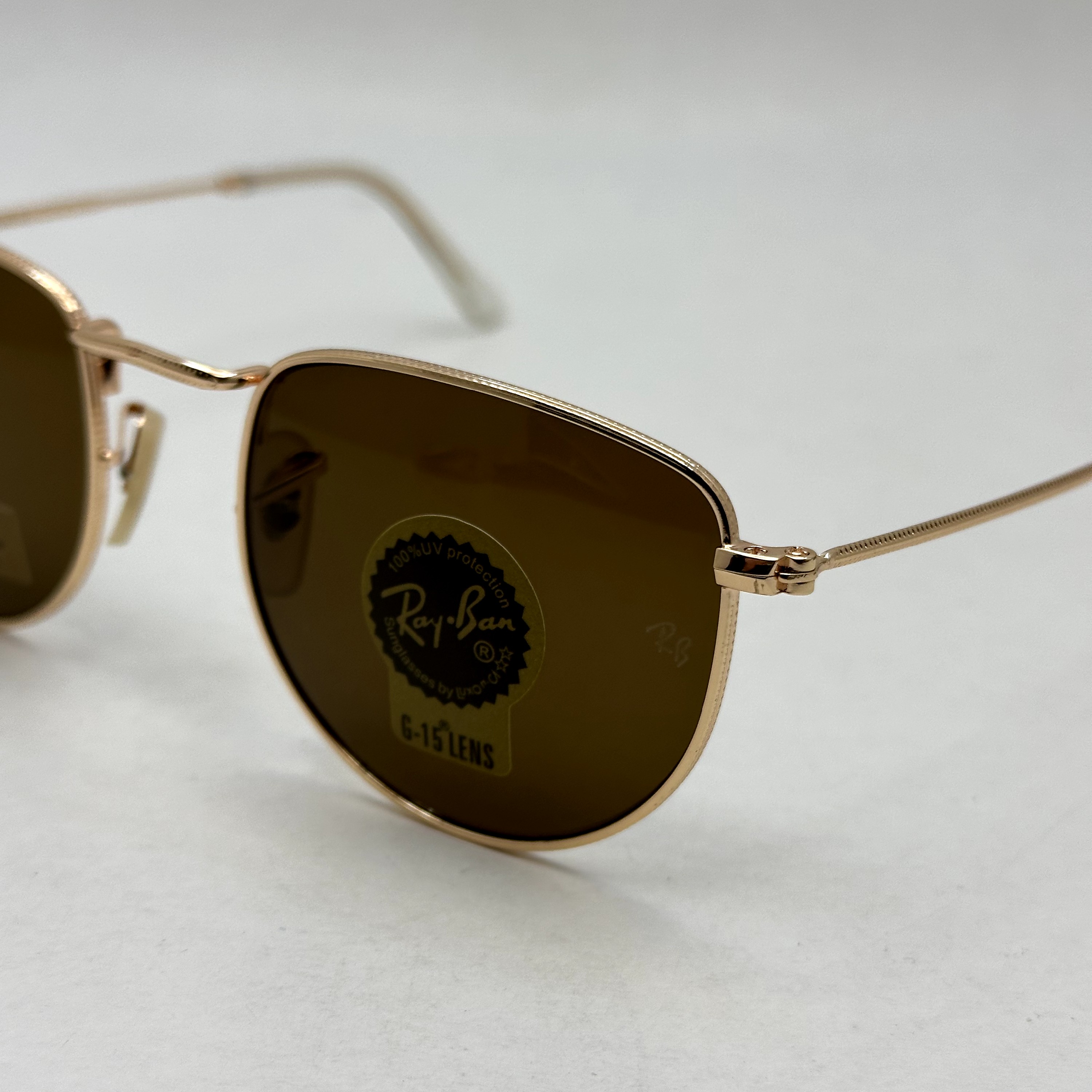 عینک آفتابی ریبن rayban شیشه سنگ قهوه ای طلایی کد rb 3958 - فول پک (ارسال رایگان)