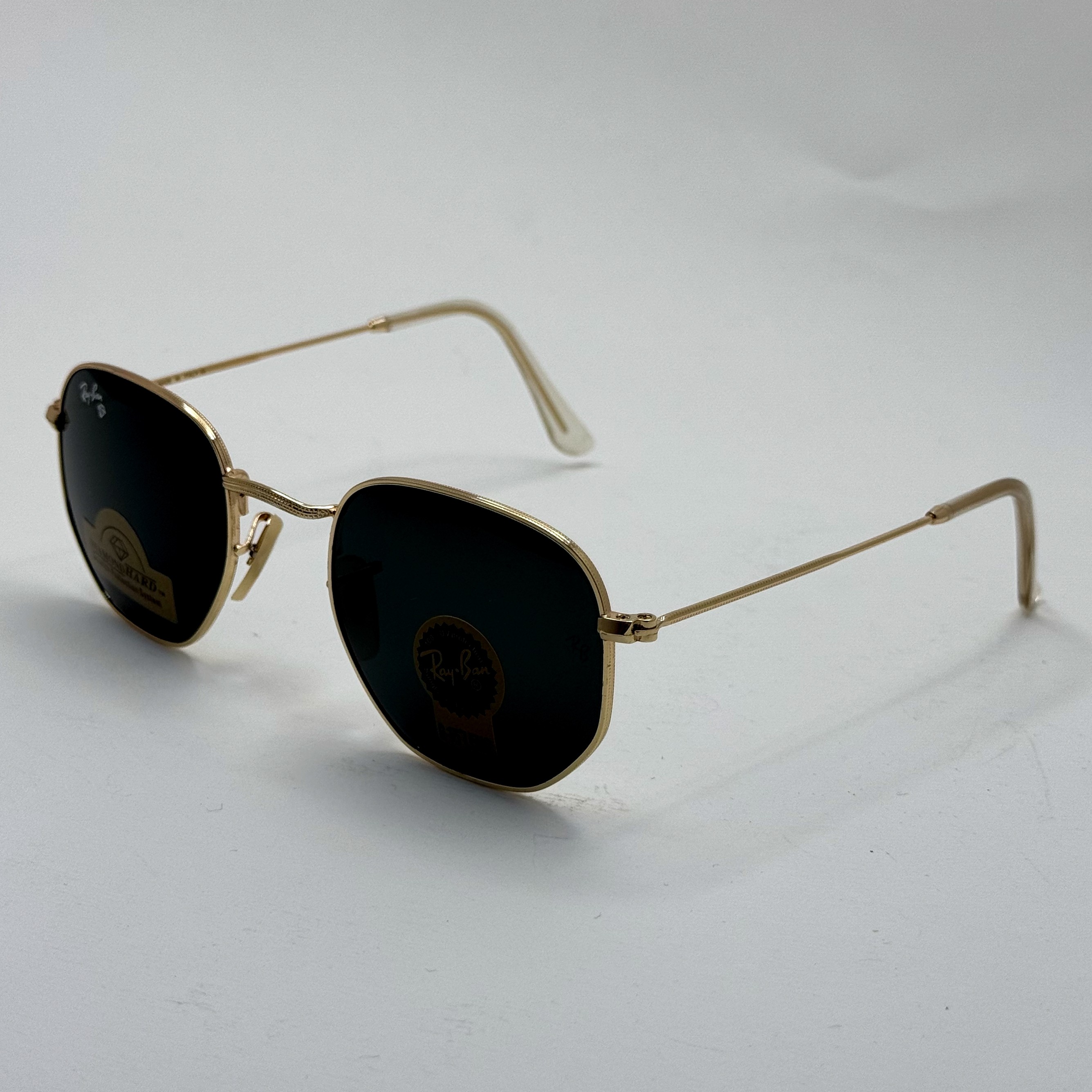 عینک ریبن هگزونال شیشه سنگ مشکی فریم طلایی به همراه پک کامل ریبن کد Rayban RB 3548 (ارسال رایگان)