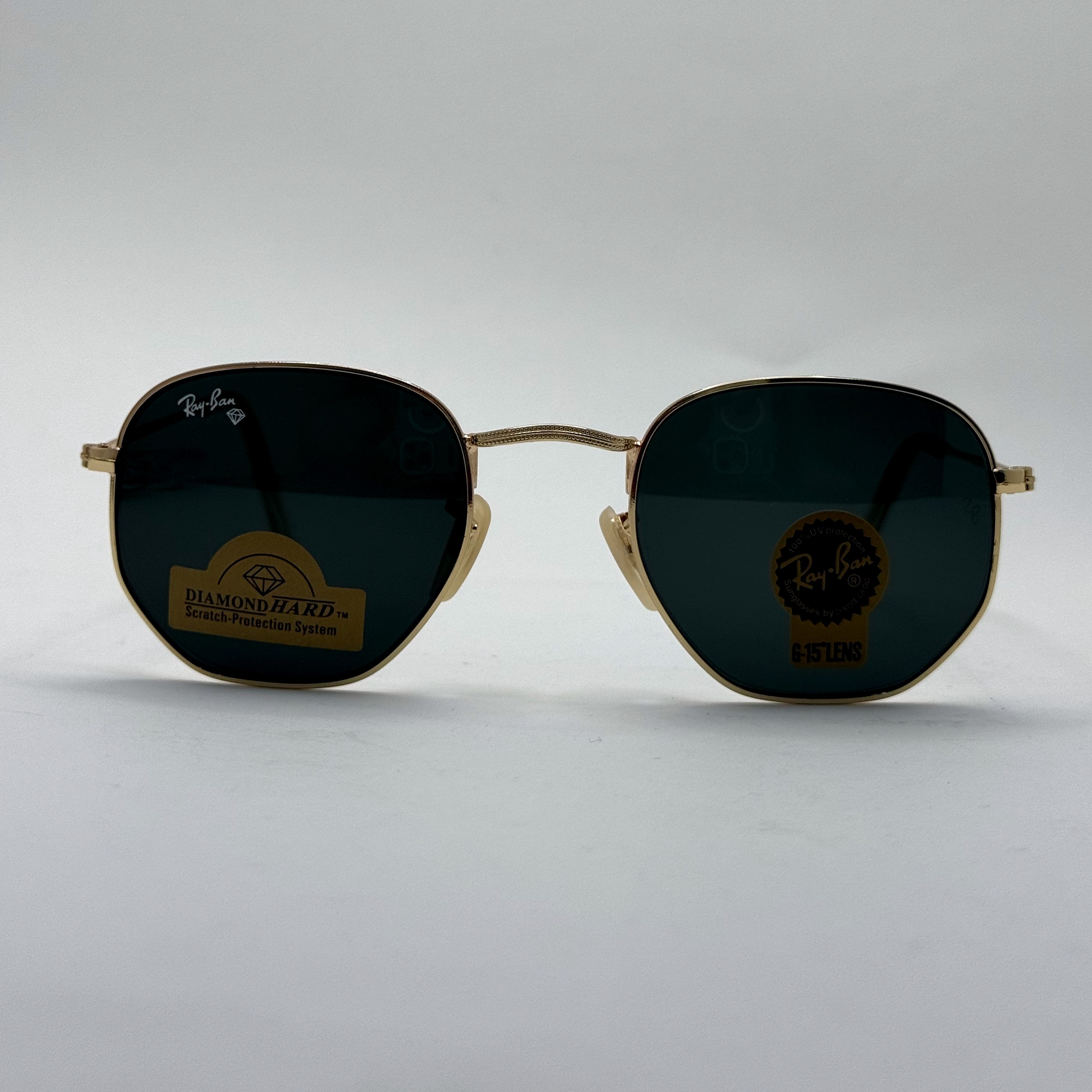 عینک ریبن هگزونال شیشه سنگ مشکی فریم طلایی به همراه پک کامل ریبن کد Rayban RB 3548 (ارسال رایگان)