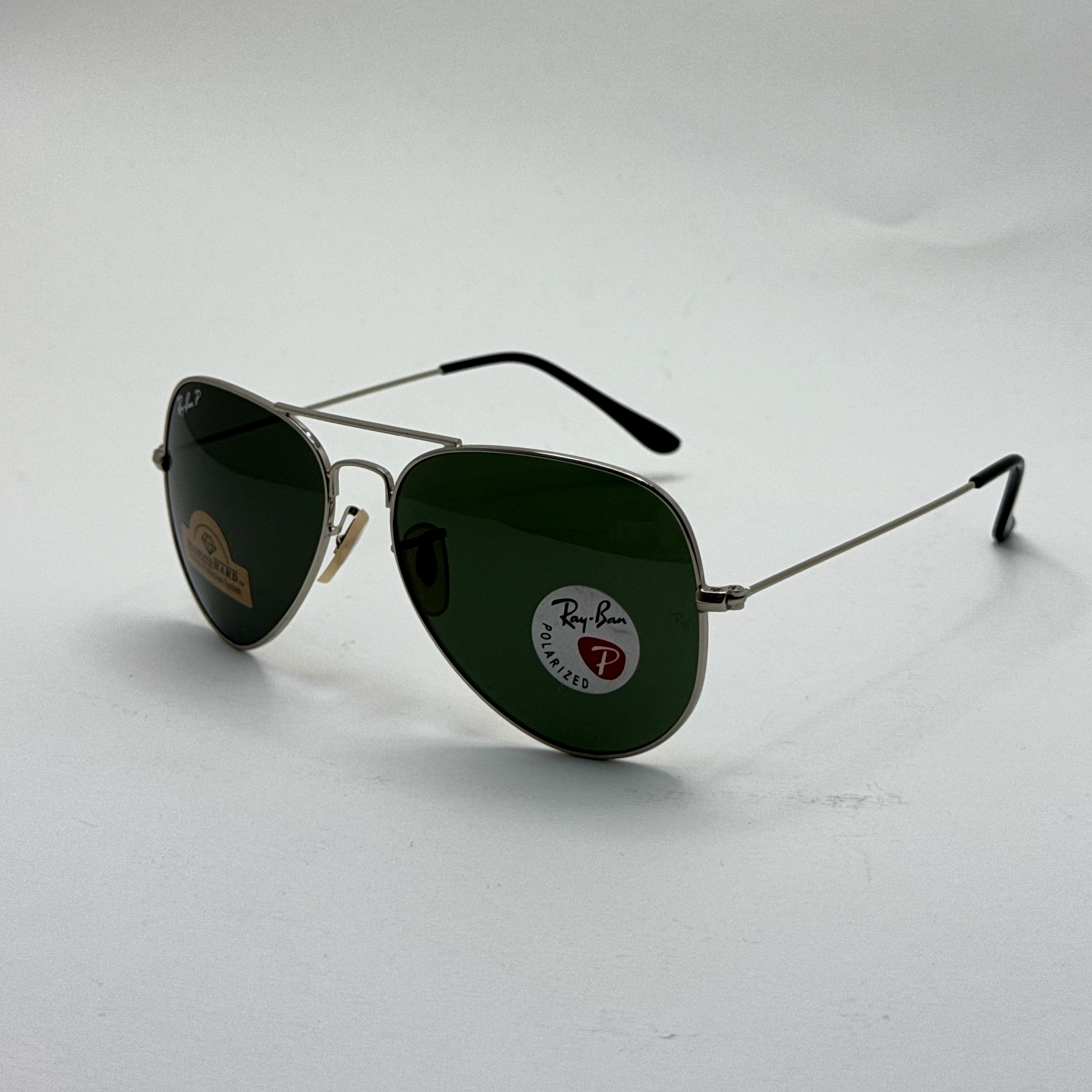 عینک ریبن خلبانی شیشه سنگ پلاریزه سبز با فریم نقره ای به همراه پک کامل ریبن کد Rayban RB 3026 (ارسال رایگان)