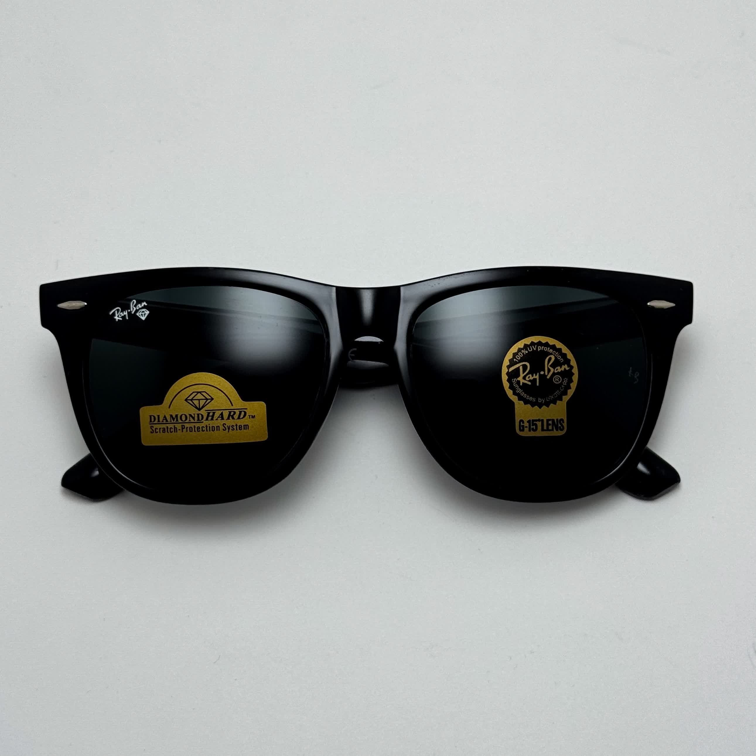 عینک آفتابی ریبن ویفرر شیشه سنگ مشکی براق به همراه پک کامل ریبن Rayban WAYFARER RB 2140 سایز 54 (ارسال رایگان)